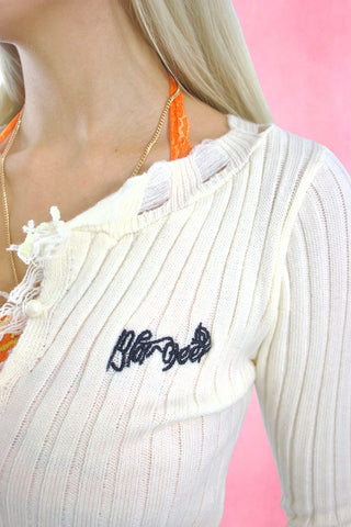 Distressed hem V-neck cardigan